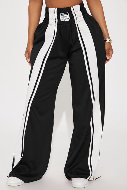 Calça Feminina Pantalona Listrado Preto – Doce Malícia
